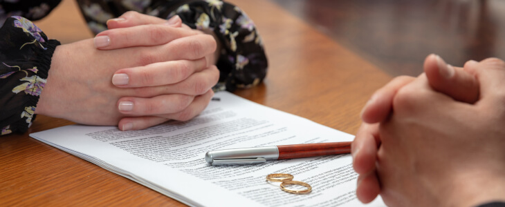 Two people going through a divorce revising a will