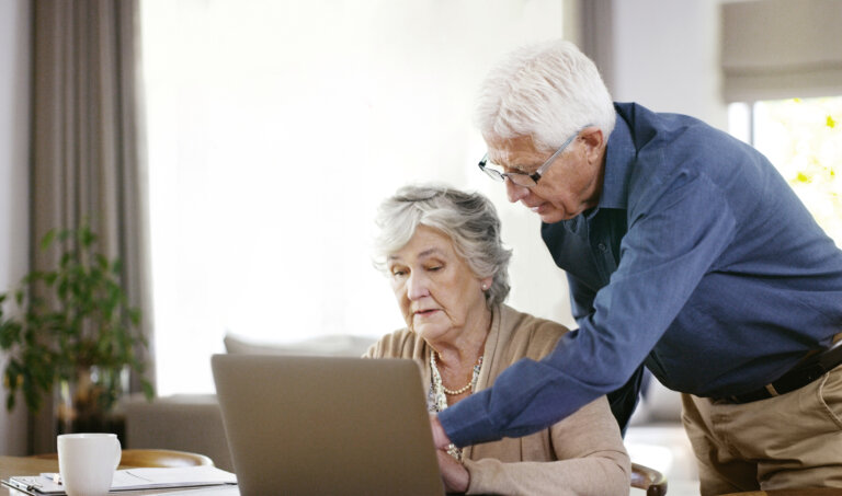 an elderly couple designating beneficiaries for their estate plan in florida