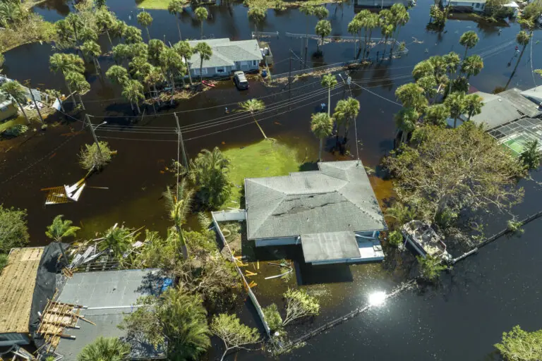 Aftermath of natural disaster. Flooded houses by hurricane Ian rainfall in Florida residential area.